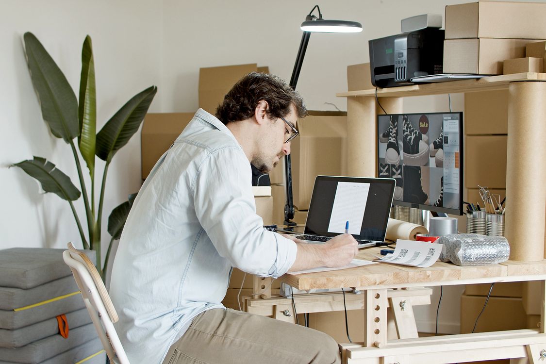 Free Man Busy Writing on the Paper Stock Photo