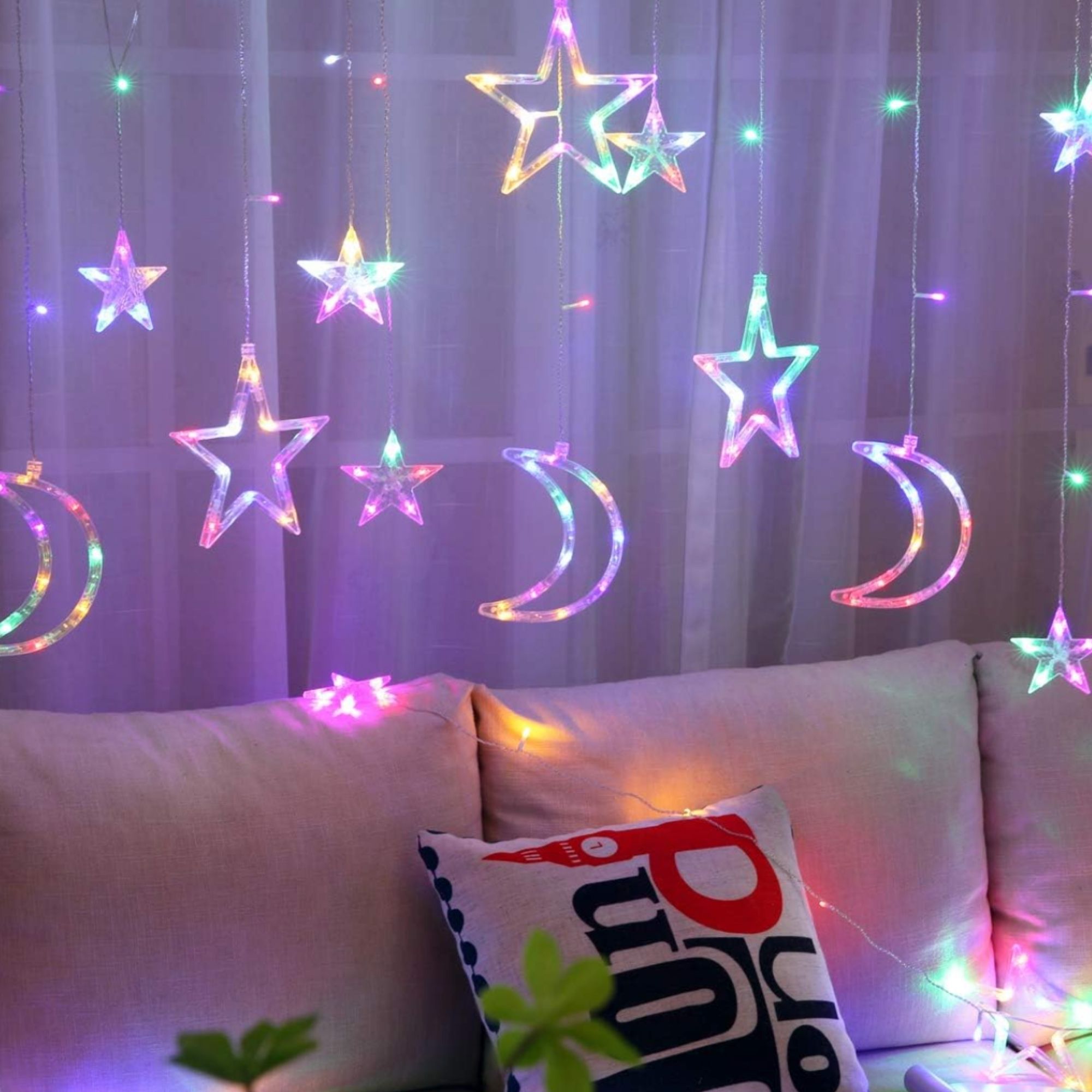 Fairy lights styled against a soft interior wall