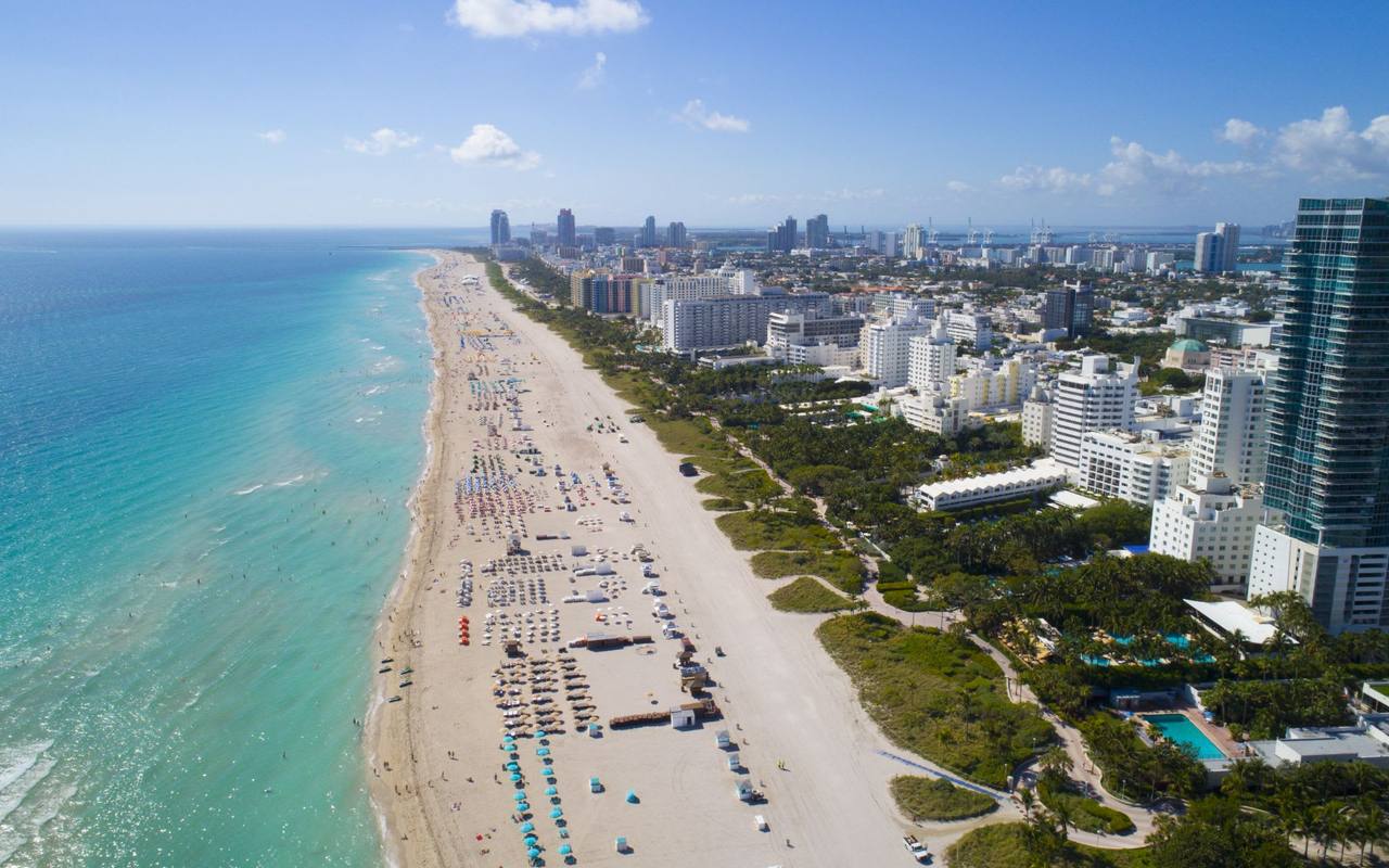 Aerial view of the beach with the Miami Beach skyline beyond