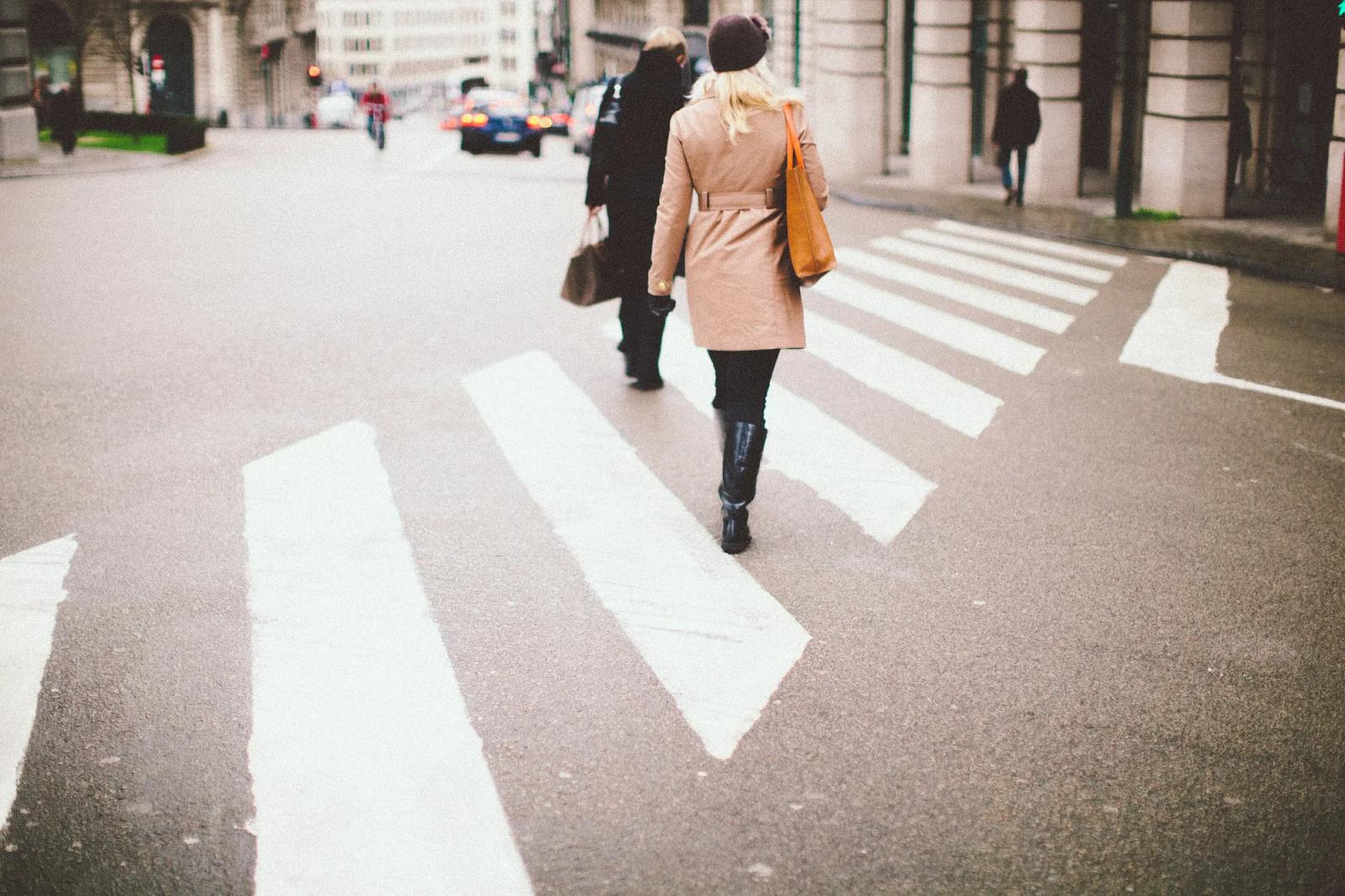 Pedestrians crossing at a crosswalk