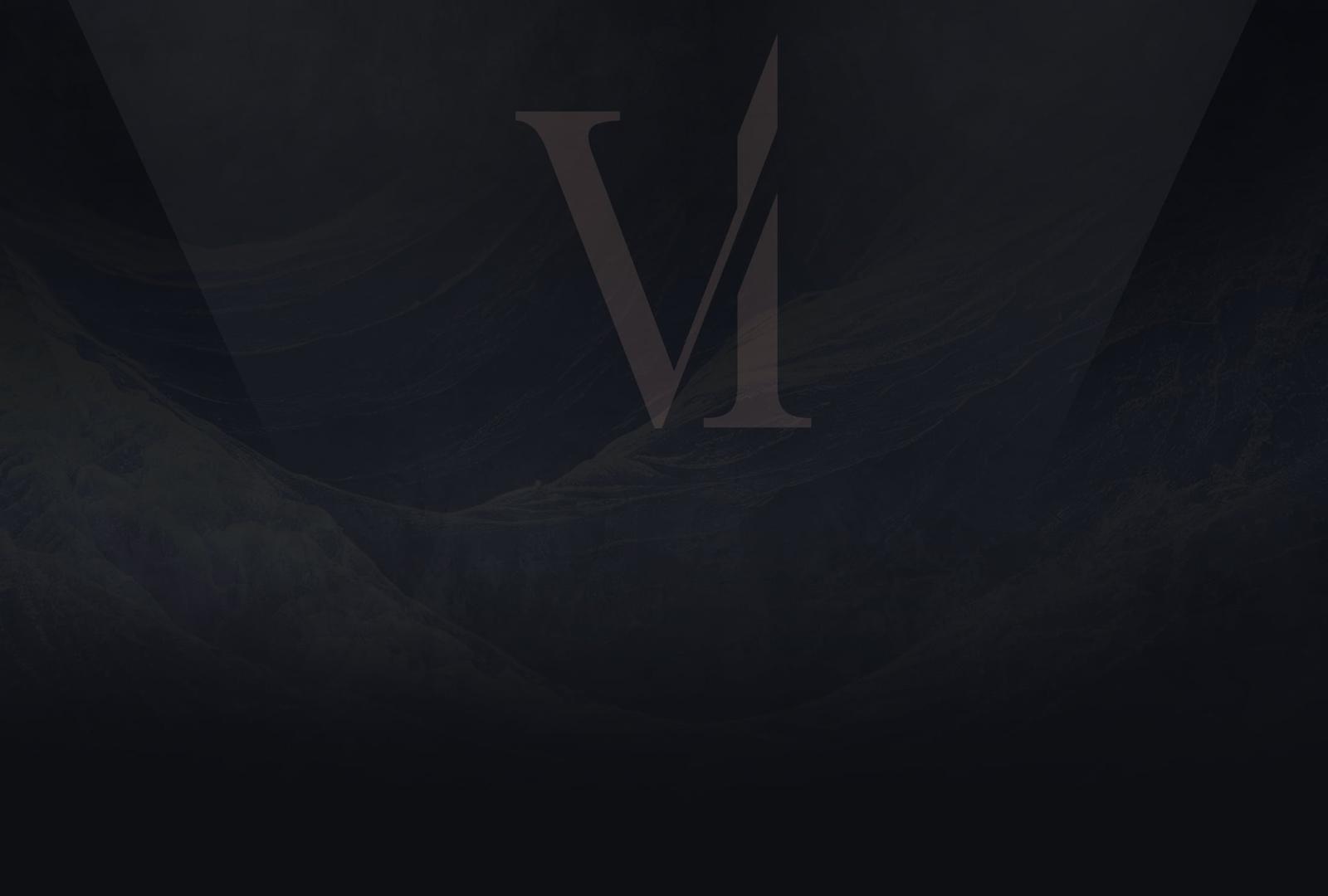 The ViKing Law monogram over dark mountain ridges